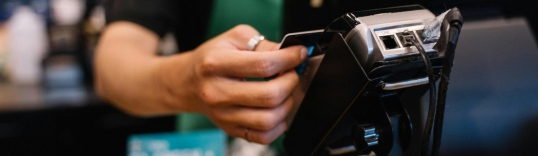 Merchant accepting Visa and MasterCard payments using FABMISR POS