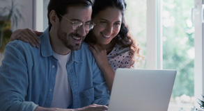 couple smiling and enjoying FAB digital services