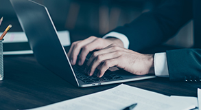 man working on laptop