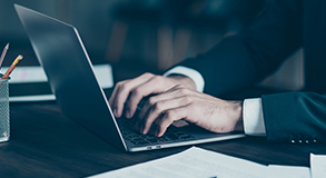 man working on laptop