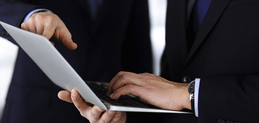 two men discussing finance