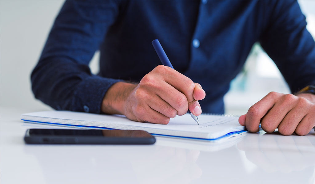 a client signing documents 