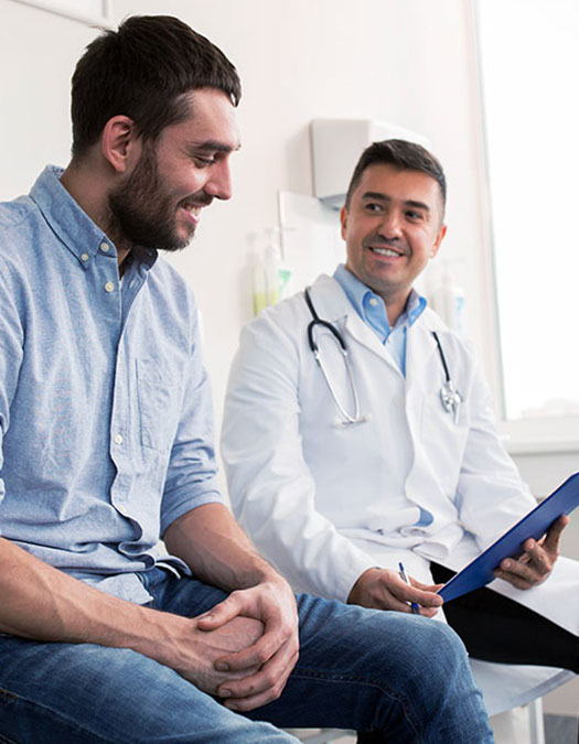 a doctor discussing results with his patient 