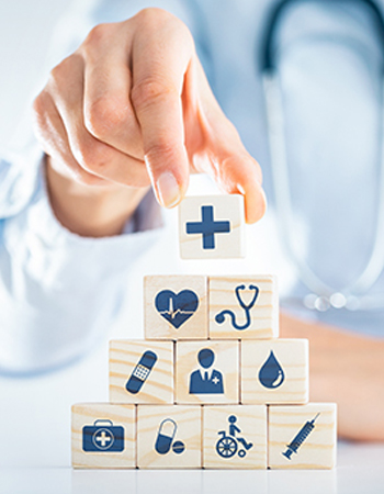 a doctor arranging boxes with medical signs