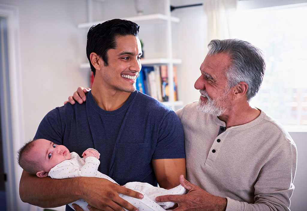 a family happy with a newborn baby